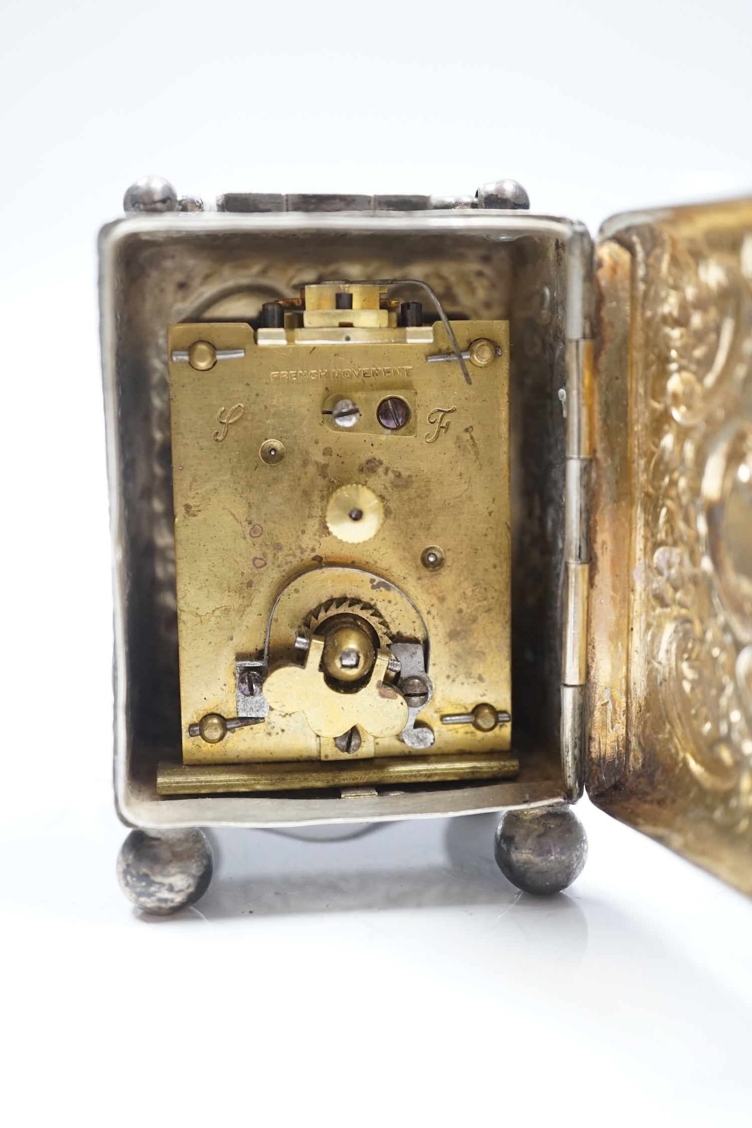 A late Victorian repousse silver cased carriage timepiece, John Newton Mappin, London, 1894, 79mm.